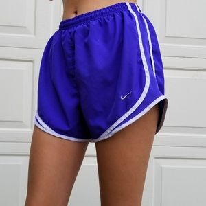 purple and white nike shorts